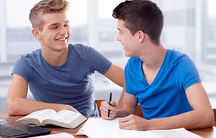 Two Men Study a Topic in the Bible